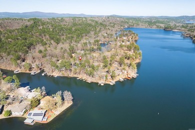 Enjoy beautiful Lake DeSoto views from the spacious deck of this on DeSoto Golf Course in Arkansas - for sale on GolfHomes.com, golf home, golf lot