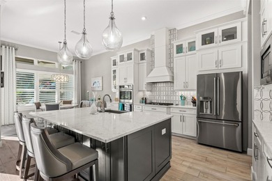 Experience resort-style living behind the gates of the highly on Esplanade Golf and Country at Lakewood Ranch in Florida - for sale on GolfHomes.com, golf home, golf lot