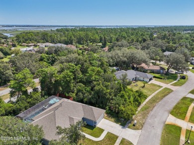 This vacant lot (10,018 sq. ft.) offers the chance to design and on St. Augustine Shores Golf Club in Florida - for sale on GolfHomes.com, golf home, golf lot