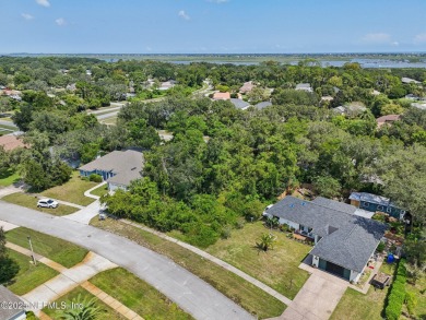 This vacant lot (10,018 sq. ft.) offers the chance to design and on St. Augustine Shores Golf Club in Florida - for sale on GolfHomes.com, golf home, golf lot