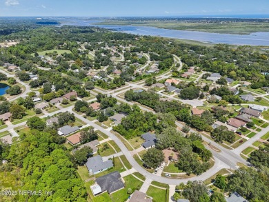 This vacant lot (10,018 sq. ft.) offers the chance to design and on St. Augustine Shores Golf Club in Florida - for sale on GolfHomes.com, golf home, golf lot