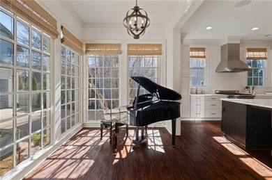 LOOKING FOR AN OWNER'S SUITE ON THE MAIN LEVEL, A 3 CAR GARAGE on Polo Golf and Country Club in Georgia - for sale on GolfHomes.com, golf home, golf lot