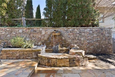 LOOKING FOR AN OWNER'S SUITE ON THE MAIN LEVEL, A 3 CAR GARAGE on Polo Golf and Country Club in Georgia - for sale on GolfHomes.com, golf home, golf lot