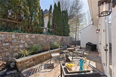 LOOKING FOR AN OWNER'S SUITE ON THE MAIN LEVEL, A 3 CAR GARAGE on Polo Golf and Country Club in Georgia - for sale on GolfHomes.com, golf home, golf lot