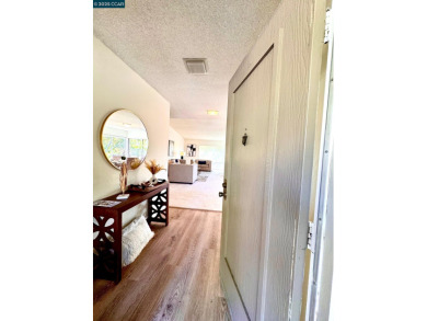 Discover refined living in this sought-after Tahoe model on Rossmoor Golf Course in California - for sale on GolfHomes.com, golf home, golf lot