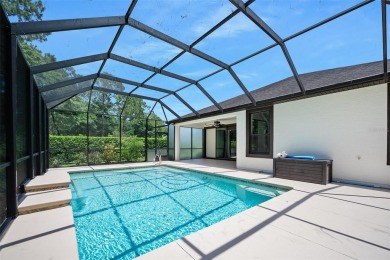 This custom home built 2018 sits on over  3/4  of an acre, in on Plantation Bay Golf and Country Club in Florida - for sale on GolfHomes.com, golf home, golf lot