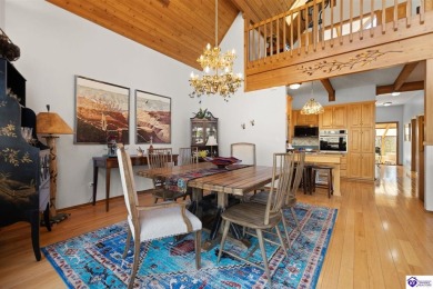 This is a custom Lindal Cedar Home that is designed to blend on Doe Valley Country Club in Kentucky - for sale on GolfHomes.com, golf home, golf lot
