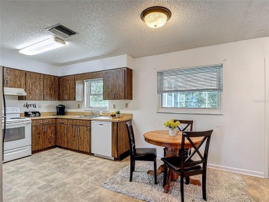 Under contract-accepting backup offers. This home sits on a on Sherman Hills Golf Club in Florida - for sale on GolfHomes.com, golf home, golf lot
