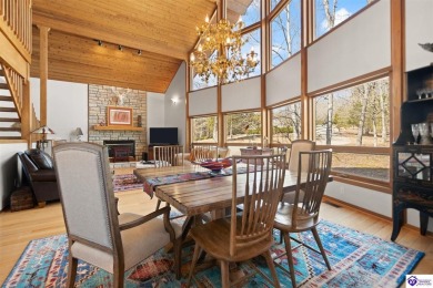 This is a custom Lindal Cedar Home that is designed to blend on Doe Valley Country Club in Kentucky - for sale on GolfHomes.com, golf home, golf lot