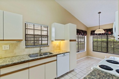 RARE OPPORTUNITY!  End-Unit Townhome with First-Floor Primary on Northdale Golf and Tennis Club in Florida - for sale on GolfHomes.com, golf home, golf lot