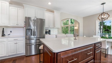 Experience the best of Porto Cima living in a villa that blends on The Club At Porto Cima in Missouri - for sale on GolfHomes.com, golf home, golf lot