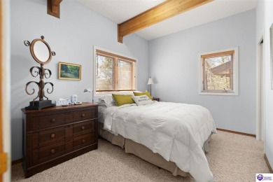 This is a custom Lindal Cedar Home that is designed to blend on Doe Valley Country Club in Kentucky - for sale on GolfHomes.com, golf home, golf lot