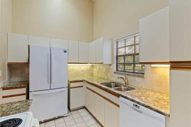 RARE OPPORTUNITY!  End-Unit Townhome with First-Floor Primary on Northdale Golf and Tennis Club in Florida - for sale on GolfHomes.com, golf home, golf lot