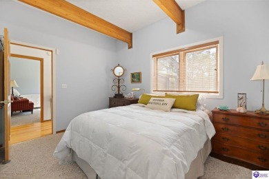 This is a custom Lindal Cedar Home that is designed to blend on Doe Valley Country Club in Kentucky - for sale on GolfHomes.com, golf home, golf lot