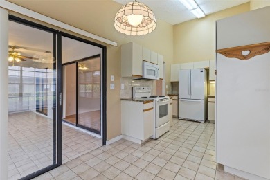 RARE OPPORTUNITY!  End-Unit Townhome with First-Floor Primary on Northdale Golf and Tennis Club in Florida - for sale on GolfHomes.com, golf home, golf lot