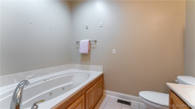 Experience the best of Porto Cima living in a villa that blends on The Club At Porto Cima in Missouri - for sale on GolfHomes.com, golf home, golf lot