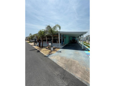 Under contract-accepting backup offers. An artist retreat on the on Grand Haven Golf Club in Florida - for sale on GolfHomes.com, golf home, golf lot