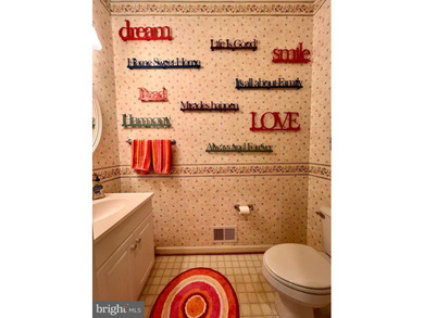 Welcome Home to 305 Brookline Drive! Spacious, bright, and airy on Locust Hill Golf Course in West Virginia - for sale on GolfHomes.com, golf home, golf lot