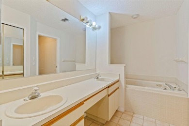 RARE OPPORTUNITY!  End-Unit Townhome with First-Floor Primary on Northdale Golf and Tennis Club in Florida - for sale on GolfHomes.com, golf home, golf lot