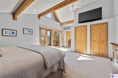 This is a custom Lindal Cedar Home that is designed to blend on Doe Valley Country Club in Kentucky - for sale on GolfHomes.com, golf home, golf lot