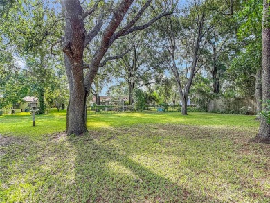 Under contract-accepting backup offers. This home sits on a on Sherman Hills Golf Club in Florida - for sale on GolfHomes.com, golf home, golf lot