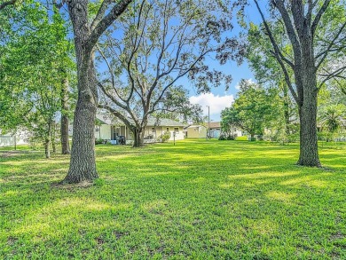 Under contract-accepting backup offers. This home sits on a on Sherman Hills Golf Club in Florida - for sale on GolfHomes.com, golf home, golf lot