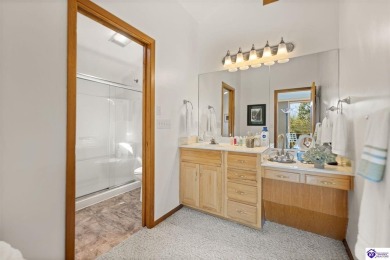 This is a custom Lindal Cedar Home that is designed to blend on Doe Valley Country Club in Kentucky - for sale on GolfHomes.com, golf home, golf lot