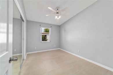 NO BOND and no CDD maintenance tax!   This 2-bedroom, 2-bath on El Diablo Executive Golf Course in Florida - for sale on GolfHomes.com, golf home, golf lot