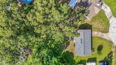 Under contract-accepting backup offers. This home sits on a on Sherman Hills Golf Club in Florida - for sale on GolfHomes.com, golf home, golf lot