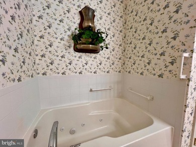 Welcome Home to 305 Brookline Drive! Spacious, bright, and airy on Locust Hill Golf Course in West Virginia - for sale on GolfHomes.com, golf home, golf lot