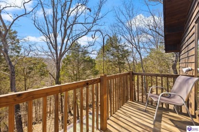 This is a custom Lindal Cedar Home that is designed to blend on Doe Valley Country Club in Kentucky - for sale on GolfHomes.com, golf home, golf lot