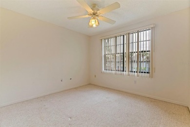 RARE OPPORTUNITY!  End-Unit Townhome with First-Floor Primary on Northdale Golf and Tennis Club in Florida - for sale on GolfHomes.com, golf home, golf lot