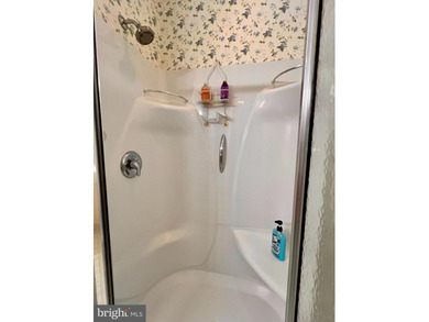 Welcome Home to 305 Brookline Drive! Spacious, bright, and airy on Locust Hill Golf Course in West Virginia - for sale on GolfHomes.com, golf home, golf lot