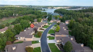 Experience the best of Porto Cima living in a villa that blends on The Club At Porto Cima in Missouri - for sale on GolfHomes.com, golf home, golf lot