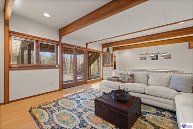 This is a custom Lindal Cedar Home that is designed to blend on Doe Valley Country Club in Kentucky - for sale on GolfHomes.com, golf home, golf lot