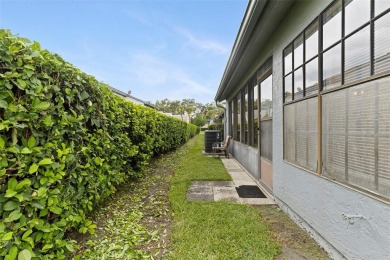 RARE OPPORTUNITY!  End-Unit Townhome with First-Floor Primary on Northdale Golf and Tennis Club in Florida - for sale on GolfHomes.com, golf home, golf lot