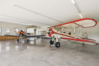 Don't miss your rare opportunity to live with your airplanes on Pecan Plantation Country Club in Texas - for sale on GolfHomes.com, golf home, golf lot