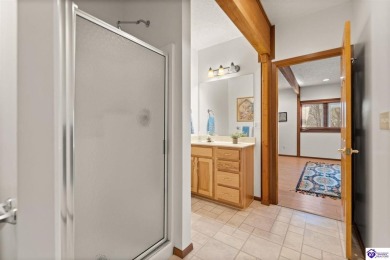This is a custom Lindal Cedar Home that is designed to blend on Doe Valley Country Club in Kentucky - for sale on GolfHomes.com, golf home, golf lot
