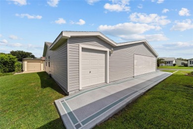 NO BOND and no CDD maintenance tax!   This 2-bedroom, 2-bath on El Diablo Executive Golf Course in Florida - for sale on GolfHomes.com, golf home, golf lot