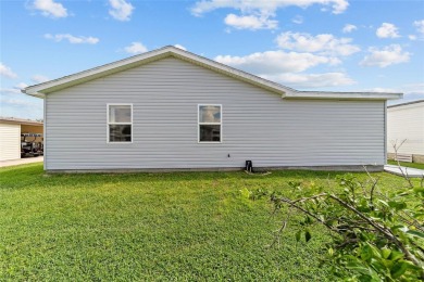 NO BOND and no CDD maintenance tax!   This 2-bedroom, 2-bath on El Diablo Executive Golf Course in Florida - for sale on GolfHomes.com, golf home, golf lot