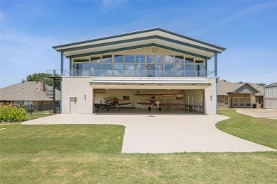 Don't miss your rare opportunity to live with your airplanes on Pecan Plantation Country Club in Texas - for sale on GolfHomes.com, golf home, golf lot