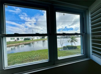 Beautiful home with a gorgeous water view! Well maintained on Mainlands Golf Club in Florida - for sale on GolfHomes.com, golf home, golf lot