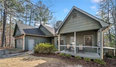 Welcome to your own slice of paradise! This charming waterfront on The Highlands Course at Lake Arrowhead in Georgia - for sale on GolfHomes.com, golf home, golf lot