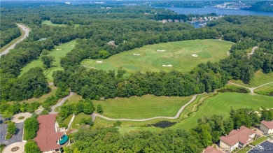 Experience the best of Porto Cima living in a villa that blends on The Club At Porto Cima in Missouri - for sale on GolfHomes.com, golf home, golf lot