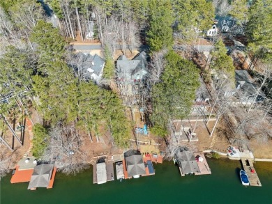 Welcome to your own slice of paradise! This charming waterfront on The Highlands Course at Lake Arrowhead in Georgia - for sale on GolfHomes.com, golf home, golf lot