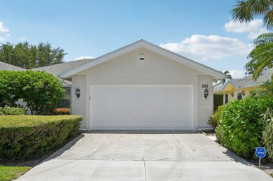 Don't miss this exceptional Divosta-built villa in highly on The Golf Club of Jupiter in Florida - for sale on GolfHomes.com, golf home, golf lot