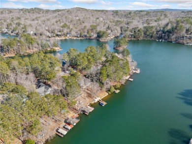 Welcome to your own slice of paradise! This charming waterfront on The Highlands Course at Lake Arrowhead in Georgia - for sale on GolfHomes.com, golf home, golf lot