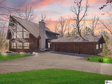 This is a custom Lindal Cedar Home that is designed to blend on Doe Valley Country Club in Kentucky - for sale on GolfHomes.com, golf home, golf lot