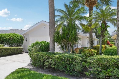 Don't miss this exceptional Divosta-built villa in highly on The Golf Club of Jupiter in Florida - for sale on GolfHomes.com, golf home, golf lot