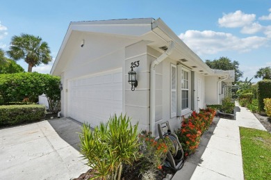 Don't miss this exceptional Divosta-built villa in highly on The Golf Club of Jupiter in Florida - for sale on GolfHomes.com, golf home, golf lot